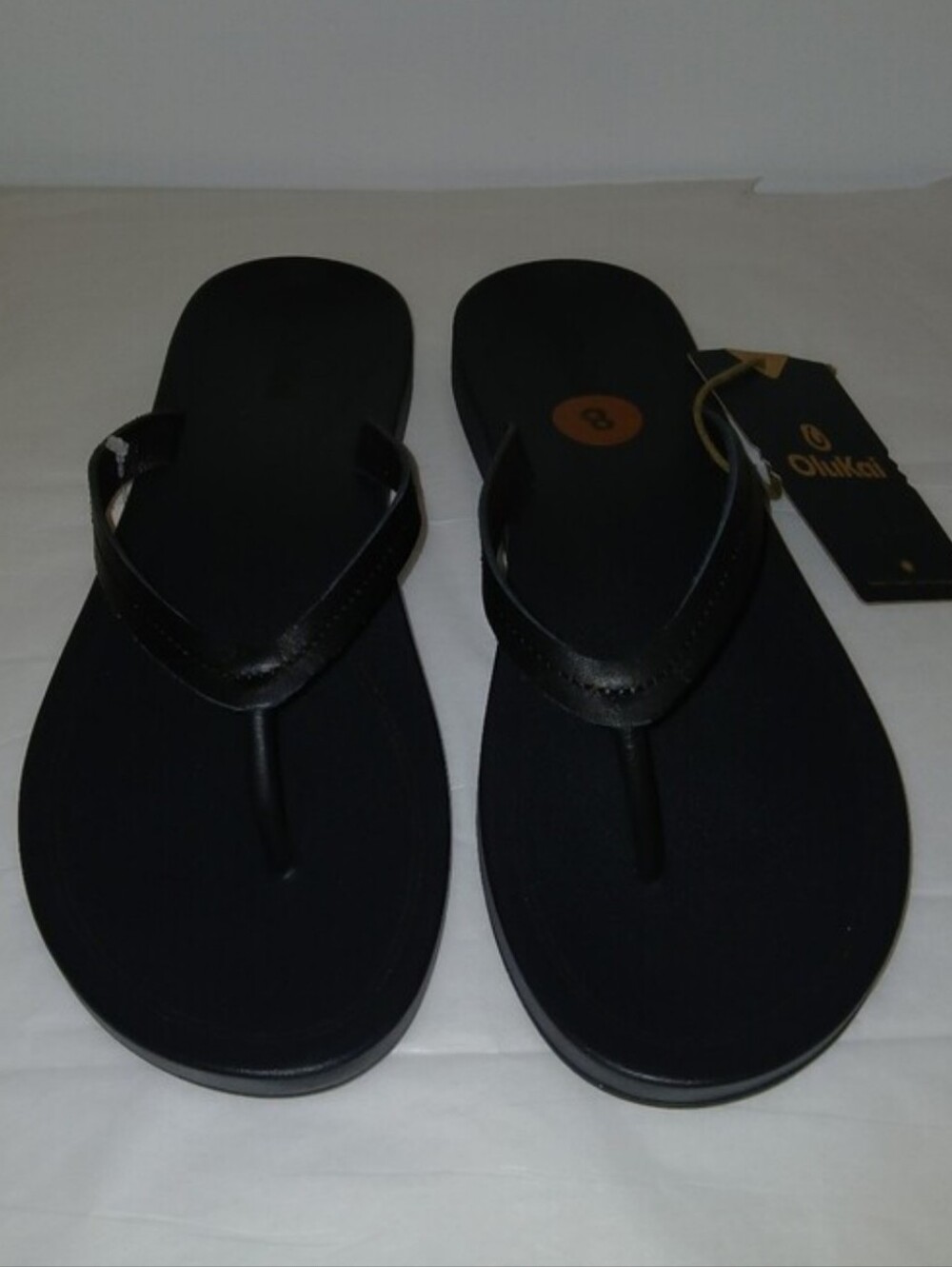 OluKai Lalali Leather Minimalist Flip Flops, Black, Non Slip Rubber Cushion